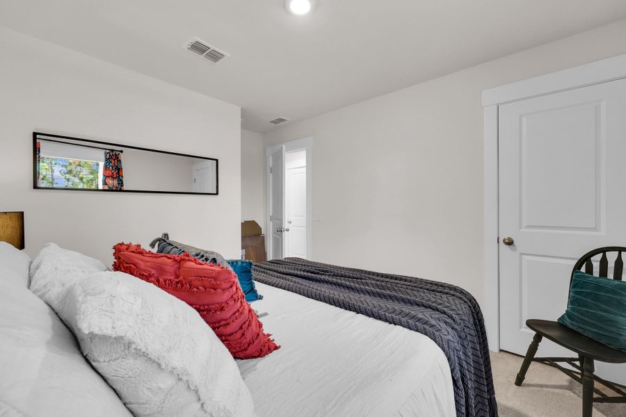 Furnished interior view inside a new home in Jasmine Point at Lakes of Cane Bay, Summerville (Image 28).