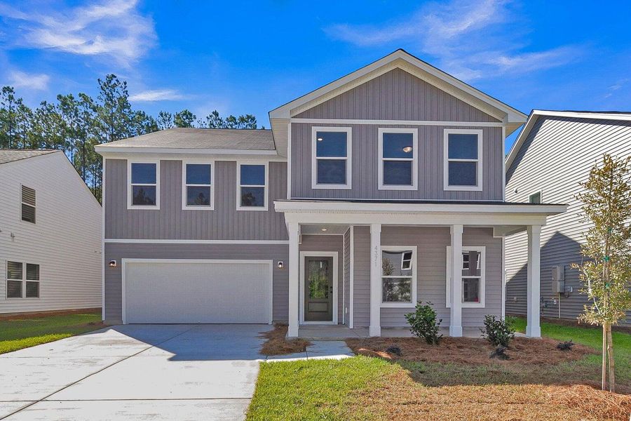 Front exterior of a new home in Tea Farm: Presidents Series, Ravenel, SC, highlighting curb appeal (Image 2).
