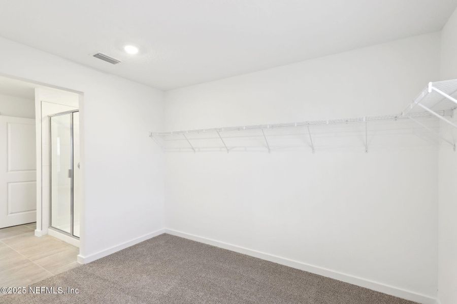 Spacious, unfurnished interior of a new home in Lakes at Bella Lago - Signature Series, Green Cove Springs (Image 36). Spacious, unfurnished interior of a new home in Lakes at Bella Lago - Signature Series, Green Cove Springs (Image 36).