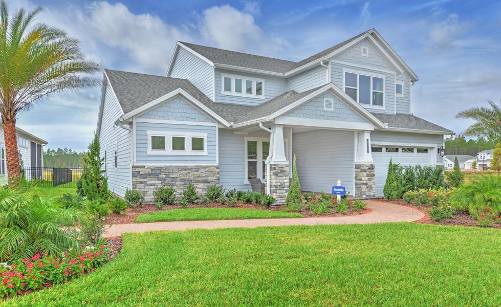 Front exterior of a new home in Middlebourne, St. Johns, FL, highlighting curb appeal (Image 2).