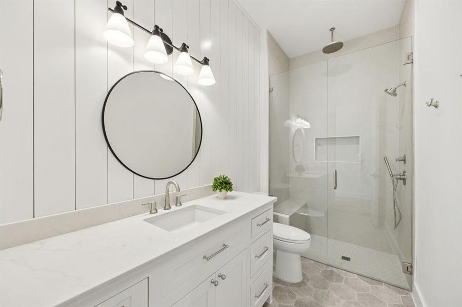 Another secondary bath - they all feature different hardware, mirrors and detail. Another secondary bath - they all feature different hardware, mirrors and detail.