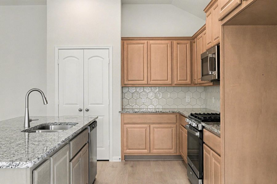 Furnished interior view inside a new home in Clear View Estates, Willis (Image 7).