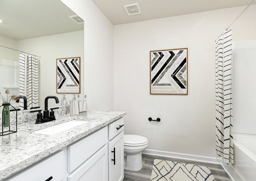 Representative furnished interior of a home built from the Charleston by LGI Homes in Lake Preserve at Jackson Trail, Hoschton (Image 6).