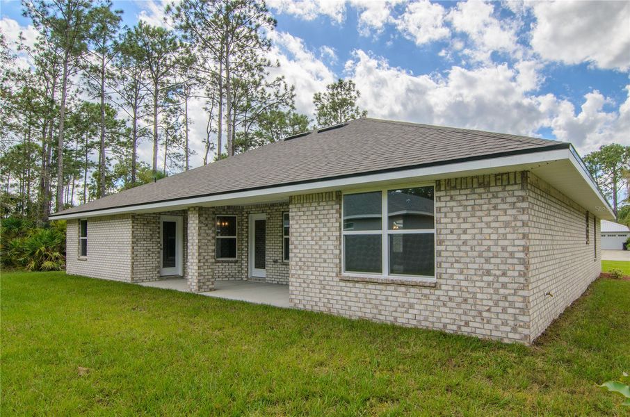 Exterior details and patio area of a home in Palm Coast, Palm Coast (Image 20).