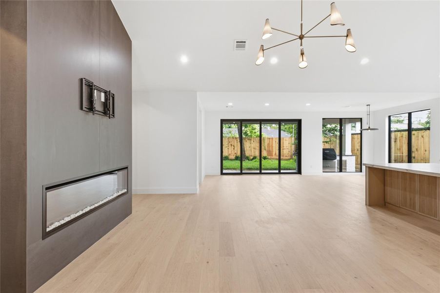 Ideal for gathering and entertaining, the open main living space creates a warm and connected atmosphere throughout the home.
