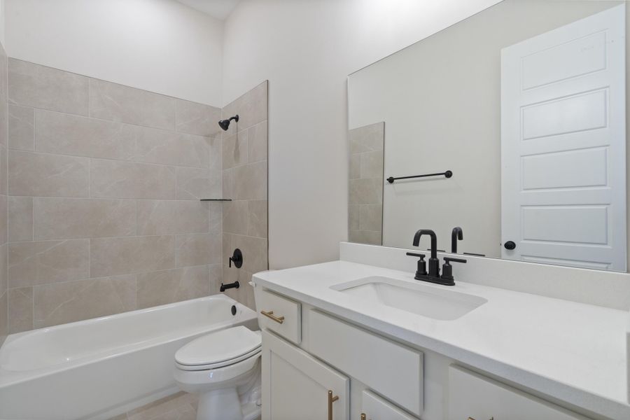 Bathroom with washtub / shower combination and vanity Bathroom with washtub / shower combination and vanity