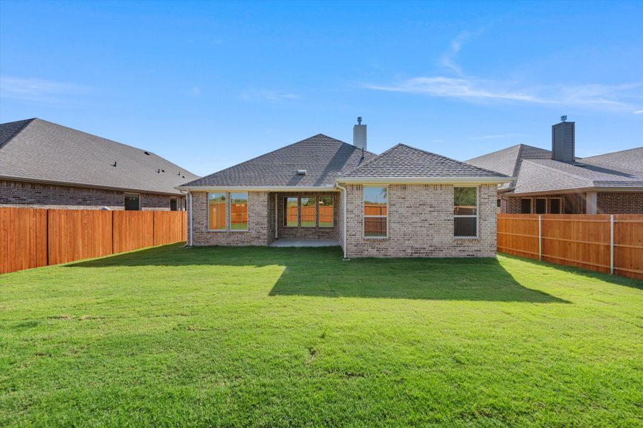 Exterior details and patio area of a home in Morningstar, Aledo (Image 29).
