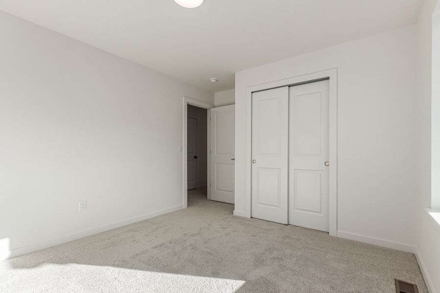 Spacious, unfurnished interior of a new home in Parkside at Victory Ridge, Colorado Springs (Image 22).