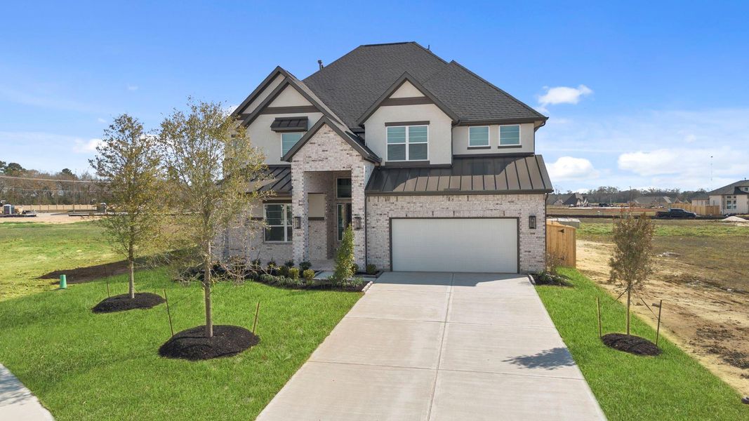 Front exterior of a new home in Briarley, Montgomery, TX, highlighting curb appeal (Image 24).