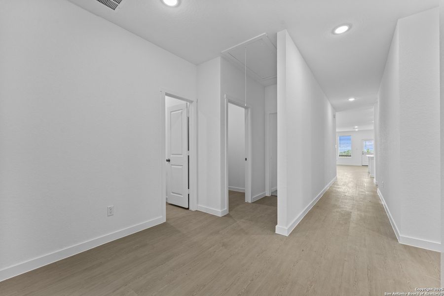 Spacious, unfurnished interior of a new home in Waterwheel: Coastline Collection, San Antonio (Image 12).