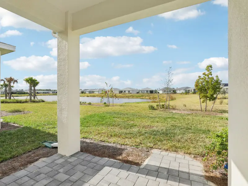 Exterior details and patio area of a home in Crescent Lakes - Reserve Series, Punta Gorda (Image 3).