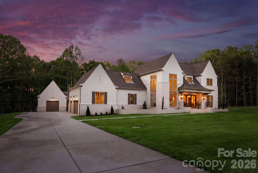 Front exterior of a new home in , Davidson, NC, highlighting curb appeal (Image 25).
