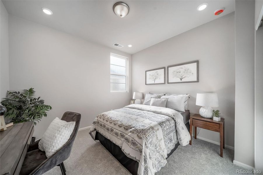 Furnished interior view inside a new home in The Reserve, Aurora (Image 11).