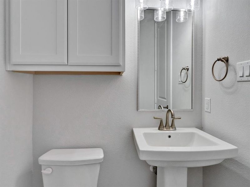 Bathroom with toilet and sink