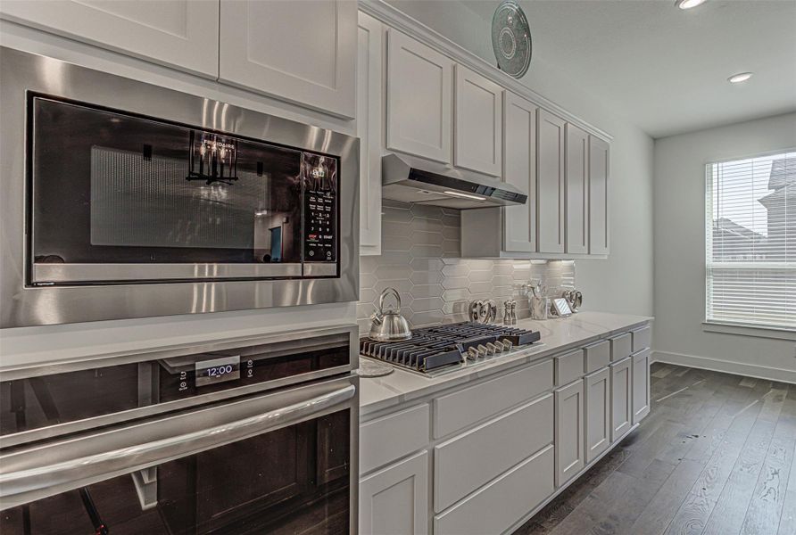 Furnished interior view inside a new home in Flora, Hutto (Image 19).