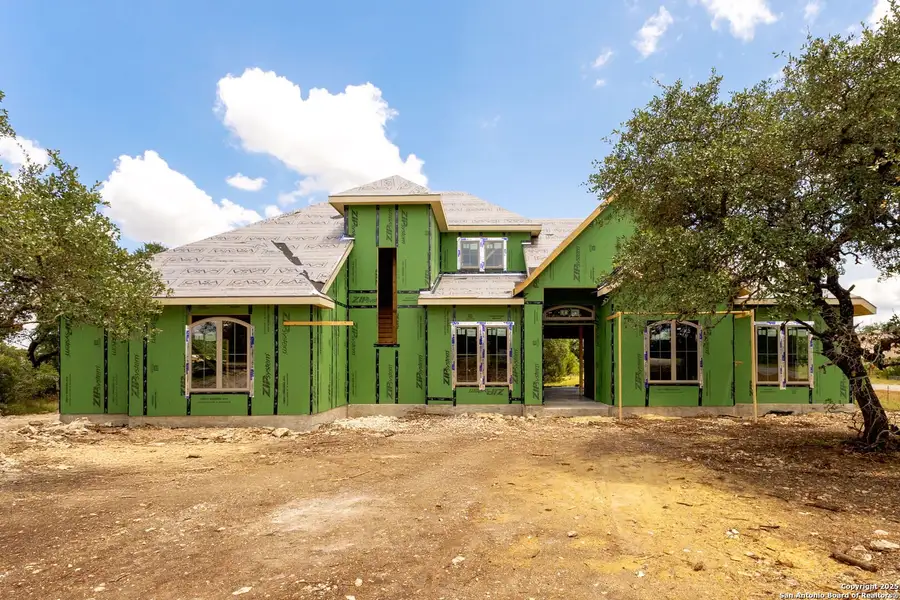 Front exterior of a new home in , Spring Branch, TX, highlighting curb appeal (Image 9).