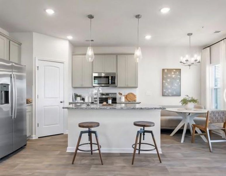 Furnished interior view inside a new home in The Enclave Townhomes, Hampton (Image 13).
