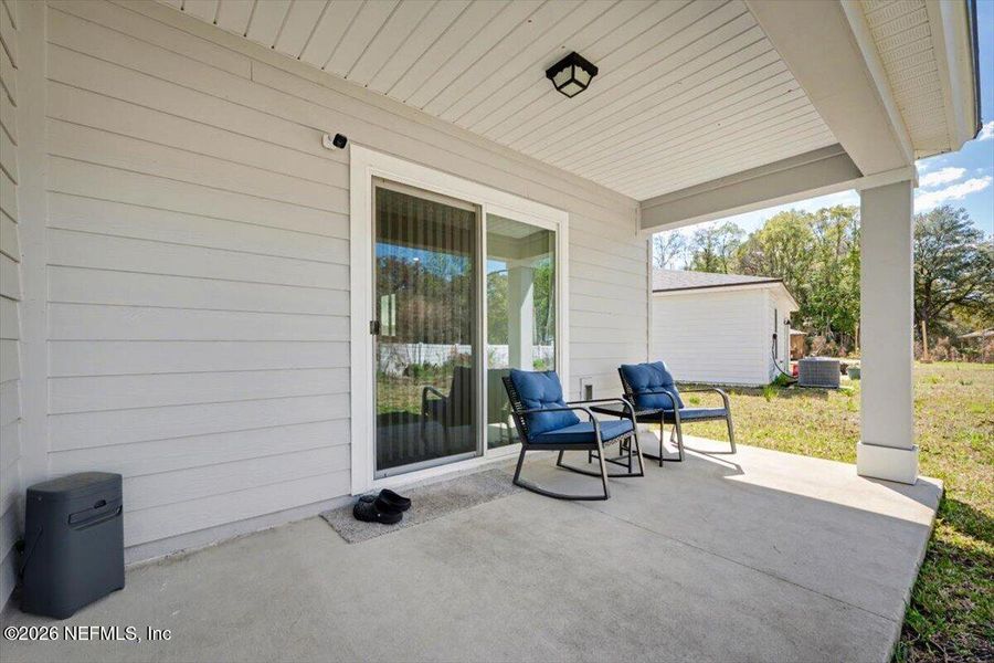 Exterior details and patio area of a home in Kings Landing, Jacksonville (Image 26).