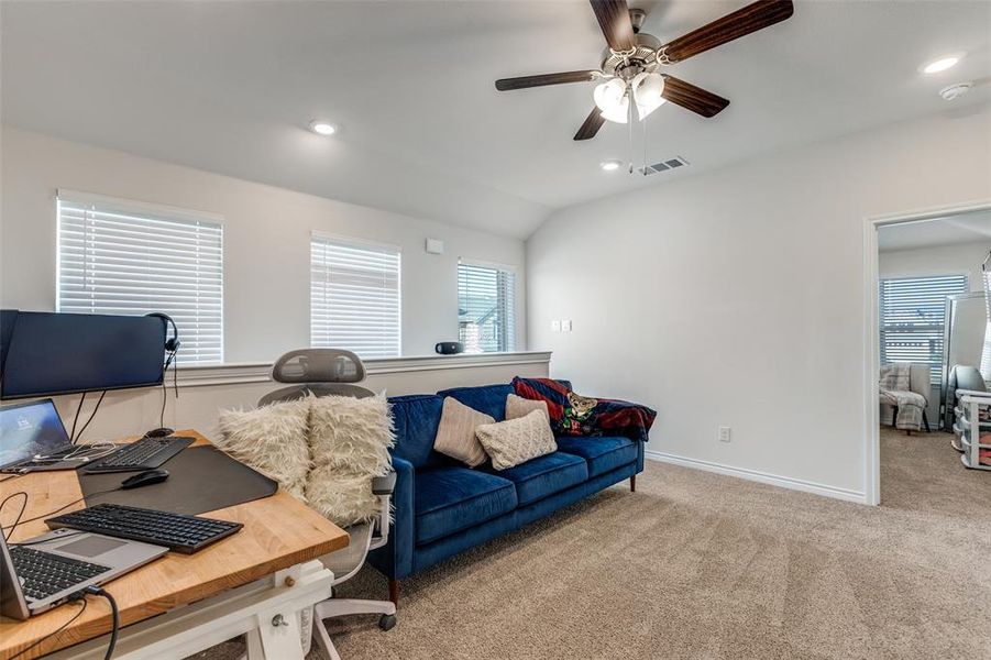 Office featuring carpet, recessed lighting, vaulted ceiling, and a ceiling fan Office featuring carpet, recessed lighting, vaulted ceiling, and a ceiling fan