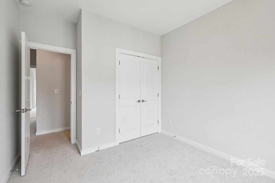 Spacious, unfurnished interior of a new home in Walk23, Huntersville (Image 18).