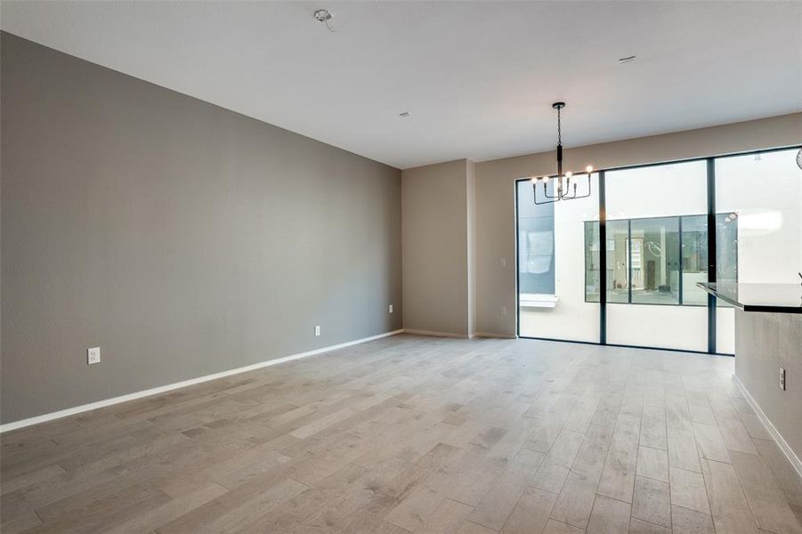Photos are of unit #204. Unit #101 will feature white cabinets and grey wood floors. Photos are of unit #204. Unit #101 will feature white cabinets and grey wood floors.