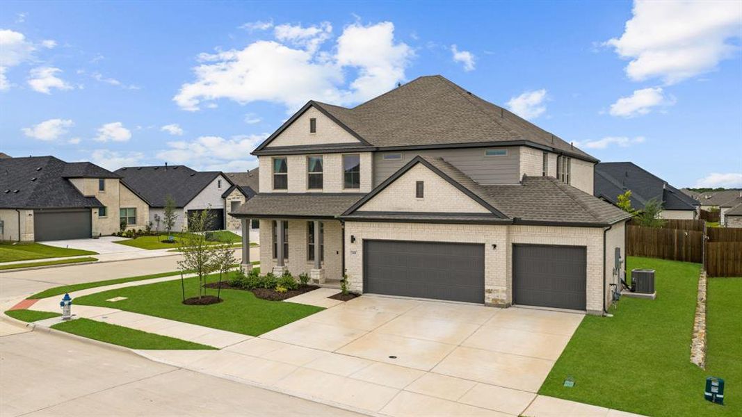 Front exterior of a new home in Elevon, Lavon, TX, highlighting curb appeal (Image 26).
