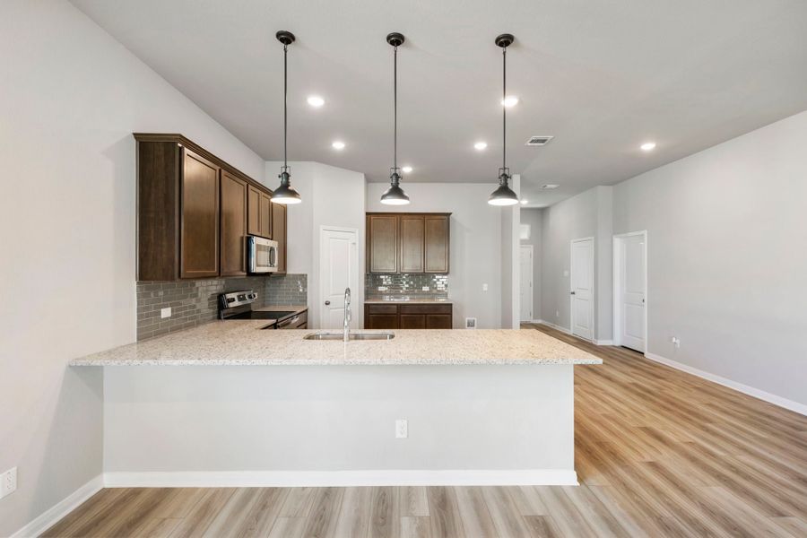 Furnished interior view inside a new home in Arroyo Ranch, Seguin (Image 7).