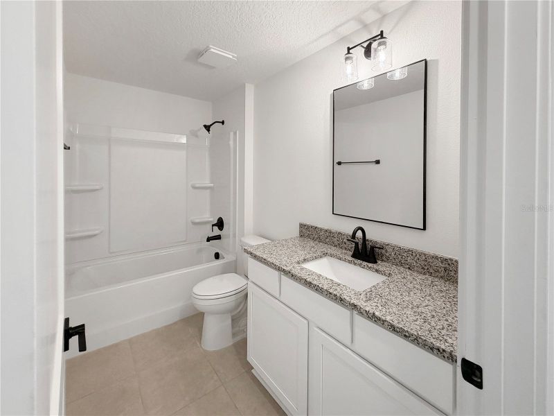 Furnished interior view inside a new home in Harmony Central, Harmony (Image 8).