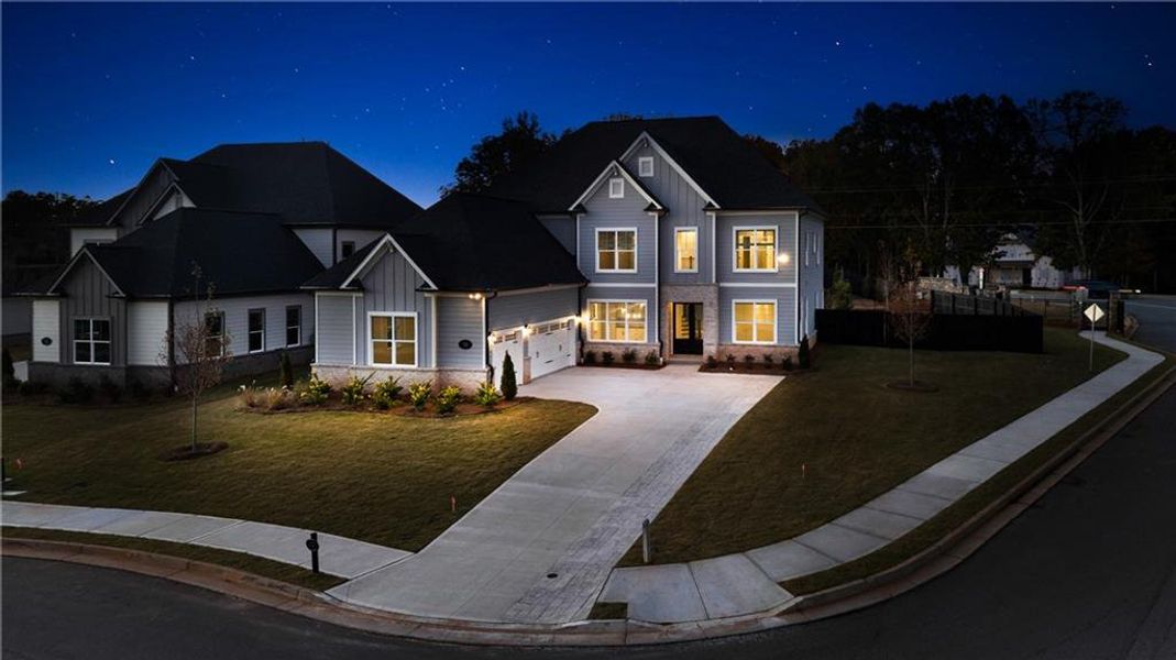 Exterior details and patio area of a home in The Retreat at Caney Creek, Alpharetta (Image 37).