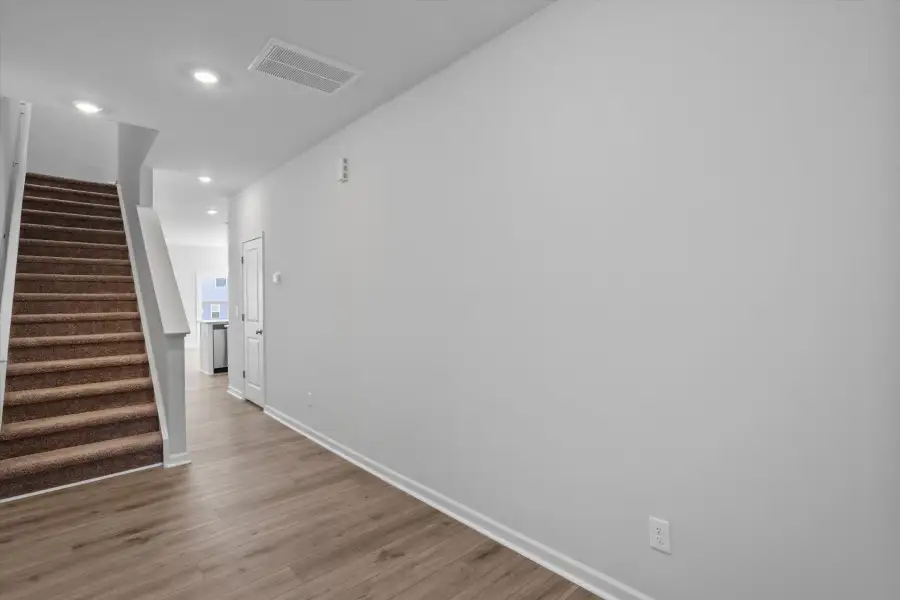Spacious, unfurnished interior of a new home in West Main Townhomes, Sanford (Image 12).