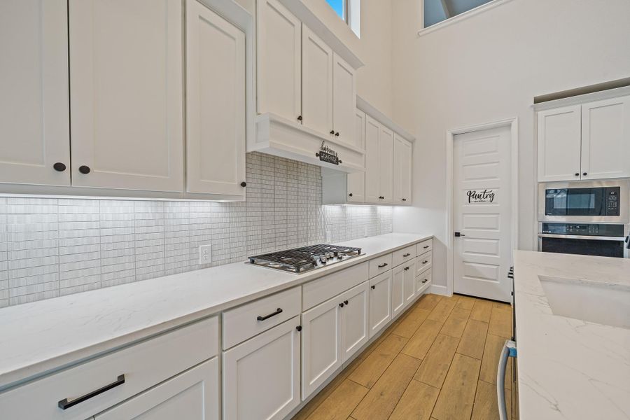 Furnished interior view inside a new home in , Brookshire (Image 9).