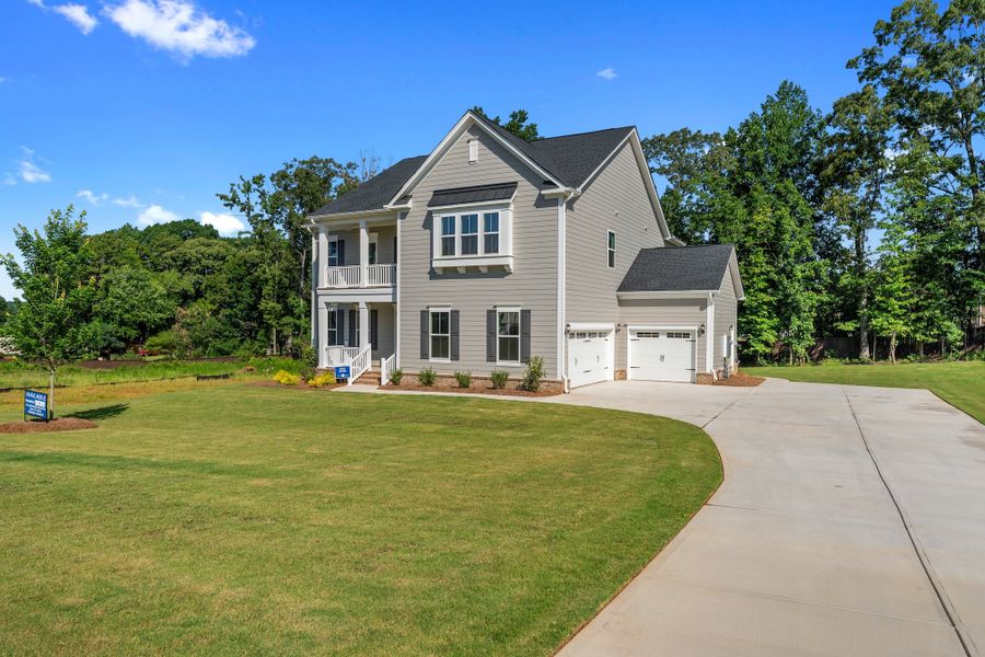 Front exterior of a new home in Suter Estates, Easley, SC, highlighting curb appeal (Image 27).