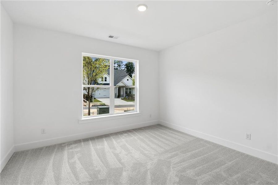 Spacious, unfurnished interior of a new home in Maple Grove at Towne Lake, Woodstock (Image 17). Spacious, unfurnished interior of a new home in Maple Grove at Towne Lake, Woodstock (Image 17).