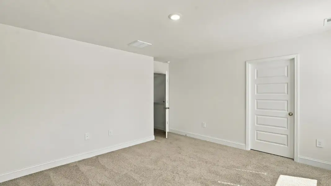 Spacious, unfurnished interior of a new home in The Lakes at North Glynn, Brunswick (Image 17).