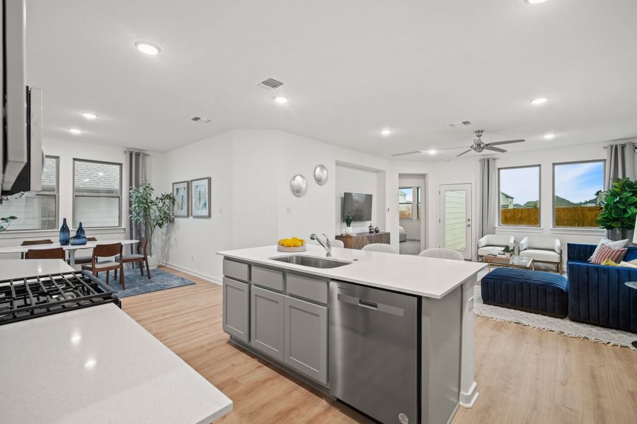 Kitchen in the Oak home plan by Trophy Signature Homes – REPRESENTATIVE PHOTO