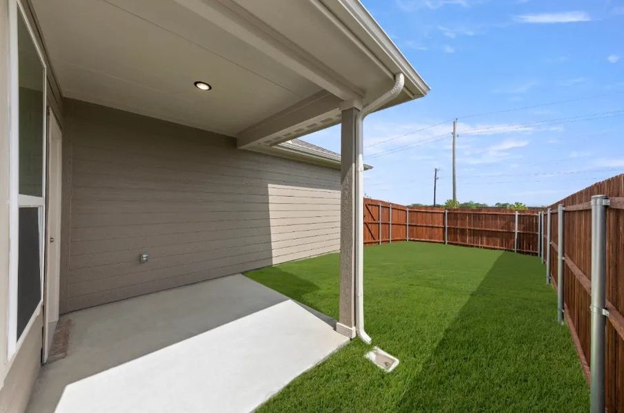 Front exterior of a new home in Heartland, Heartland, TX, highlighting curb appeal (Image 29). Front exterior of a new home in Heartland, Heartland, TX, highlighting curb appeal (Image 29).