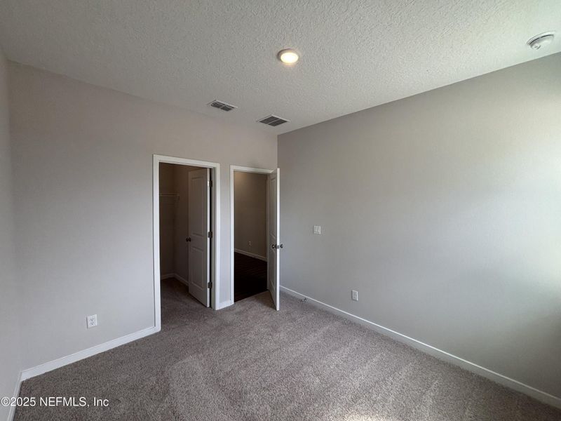 Spacious, unfurnished interior of a new home in The Magnolia Series at Reserve East, Flagler Beach (Image 27).