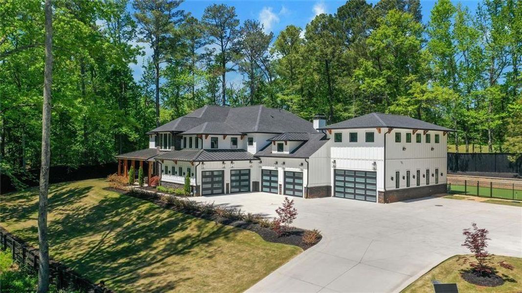 Front exterior of a new home in , Roswell, GA, highlighting curb appeal (Image 25).