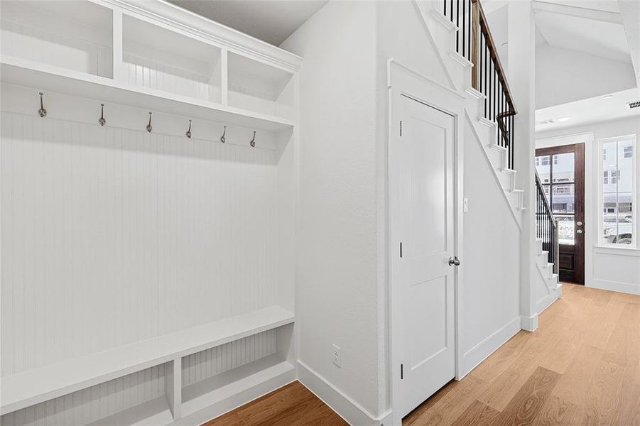 Mudroom featuring light wood-type flooring Mudroom featuring light wood-type flooring