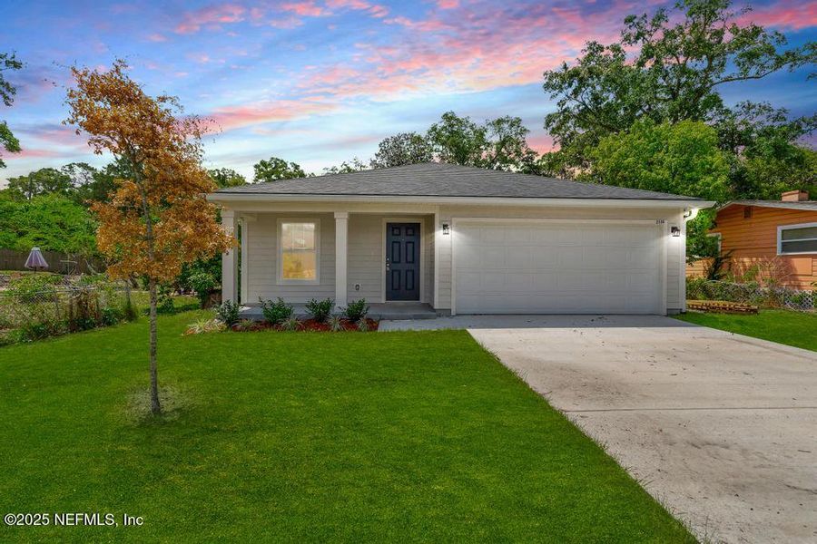 Front exterior of a new home in , Jacksonville, FL, highlighting curb appeal (Image 2). Front exterior of a new home in , Jacksonville, FL, highlighting curb appeal (Image 2).