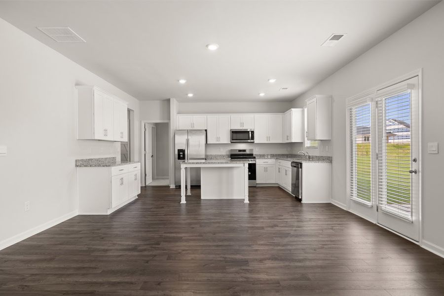 Representative unfurnished interior of a home built from the Mansfield by D.R. Horton in Southwind Village, Evans (Image 16).