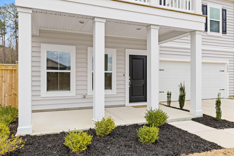 Exterior details and patio area of a home in Sweetgrass at Summers Corner, Summerville (Image 21).