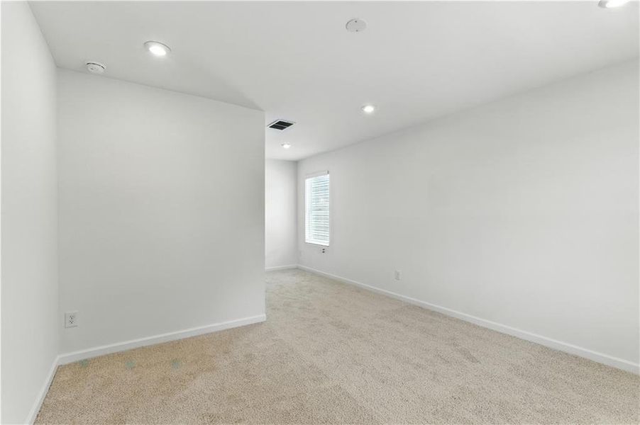 Spacious, unfurnished interior of a new home in The View at Groover’s Lake, Lithia Springs (Image 9).