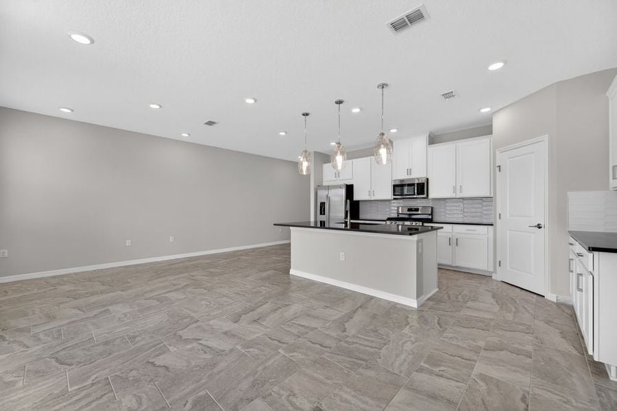 Furnished interior view inside a new home in Cherry Elm at SilverLeaf, St. Augustine (Image 8). Furnished interior view inside a new home in Cherry Elm at SilverLeaf, St. Augustine (Image 8).