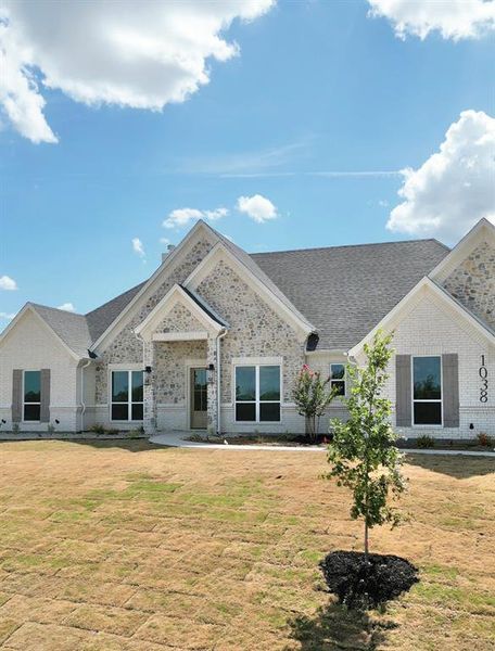 Front exterior of a new home in , Azle, TX, highlighting curb appeal (Image 19).