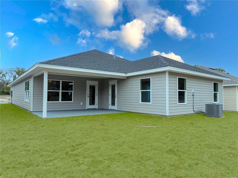Exterior details and patio area of a home in Briarwood, Alachua (Image 28).