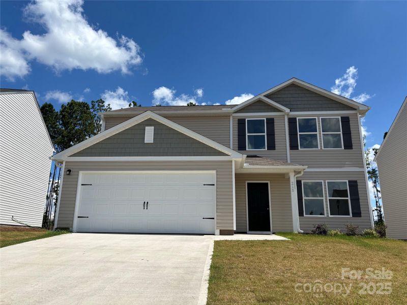 Front exterior of a new home in Buffalo Creek, Union, SC, highlighting curb appeal (Image 1).