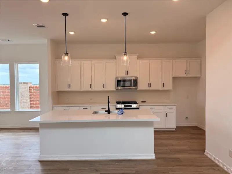 Furnished interior view inside a new home in Wildrye, Waller (Image 6).
