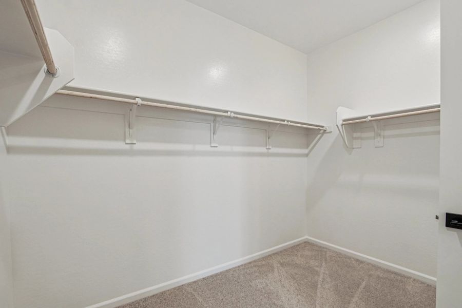 Primary walk in closet Primary walk in closet