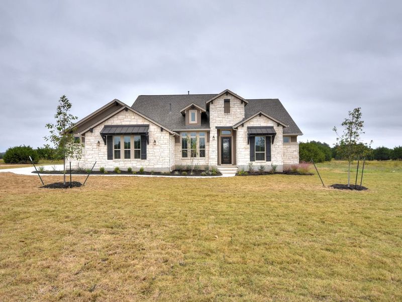 Representative exterior photo of a completed home built from the San Simeon I by Giddens Homes in Clearwater Ranch, Liberty Hill, TX (Image 44).